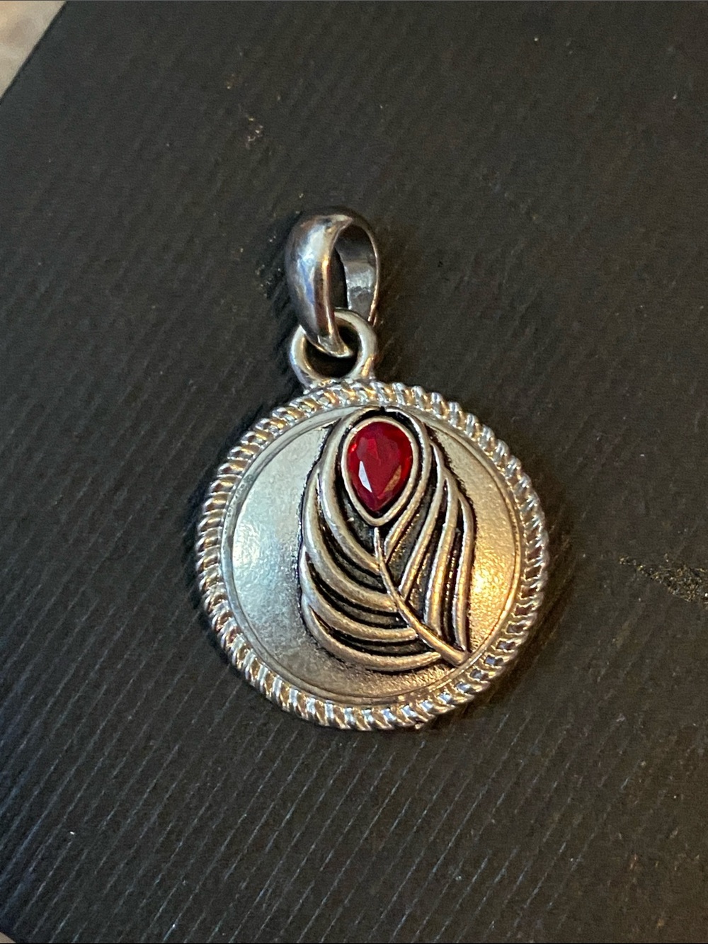 Silver Peacock Feather Pendant with Red Stone